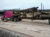 The wood from the elm trees taken down for Highway 61 work on their way to Hedstrom Lumber. Photo courtesy of CEC